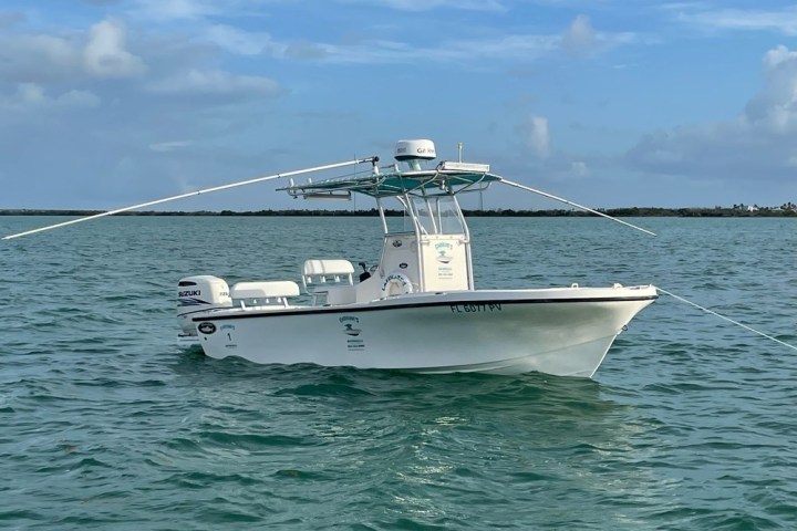 a small boat in a large body of water